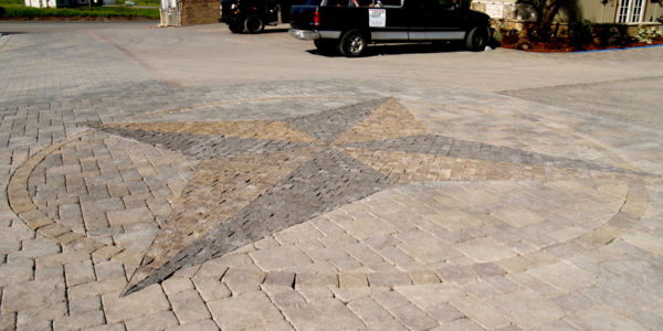 A beautiful stone compass inlay by Legacy Pavers