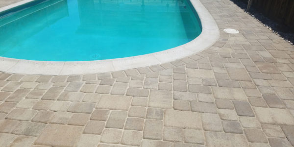 Stone pavers form a swimming pool deck in Marin County