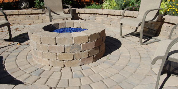 Patio with firepit create by The Legacy Paver Group