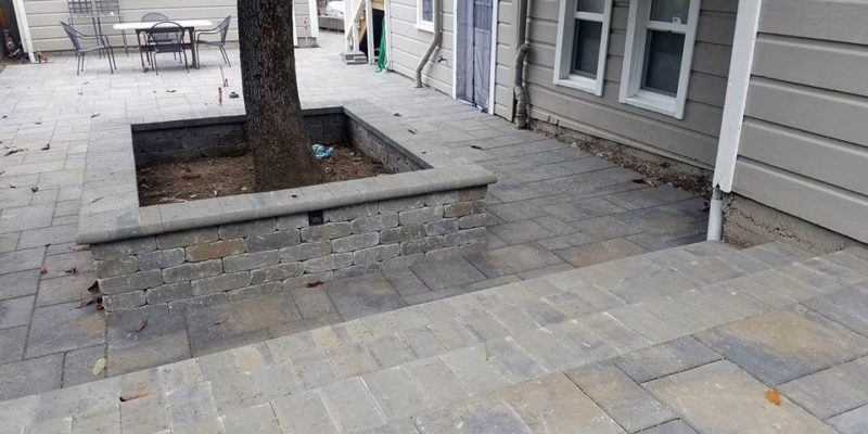 Stone pavers create a beautiful patio area.